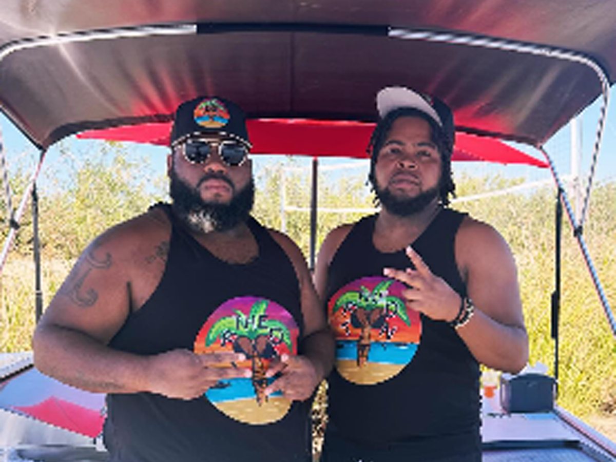 Abdul and his brother aboard